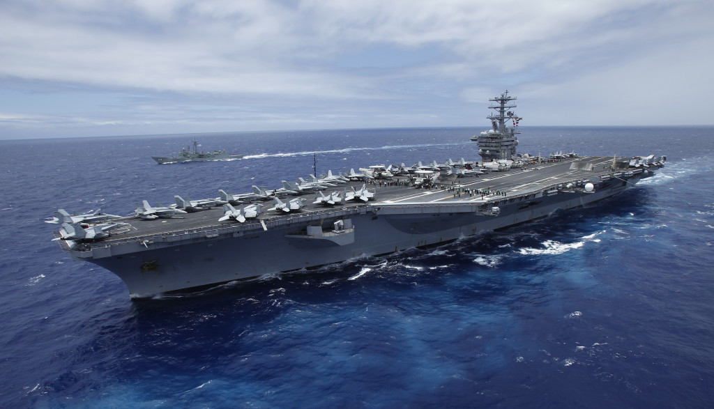 USS Nimitz aircraft carrier sails about 150 miles north of the island of Oahu during the RIMPAC Naval exercises off Hawaii